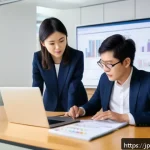 T자형 전문성과 데이터 분석의 중요성 - A modern Japanese office setting with diverse professionals collaborating around a large table, show...